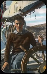 Image of Boy at Wheel of Bowdoin (Dr. Paddon's Son)